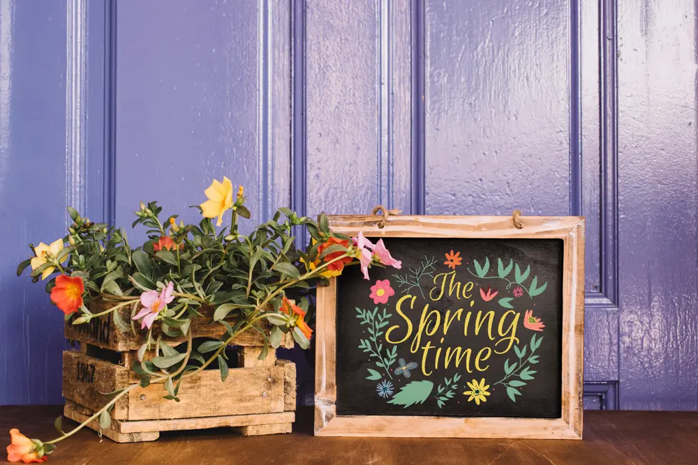 Wooden sign and box with flowers with designs printed on them