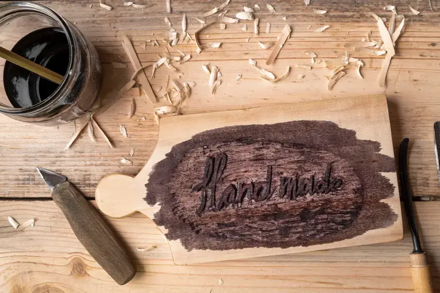 Cutting board on counter with designs printed on it
